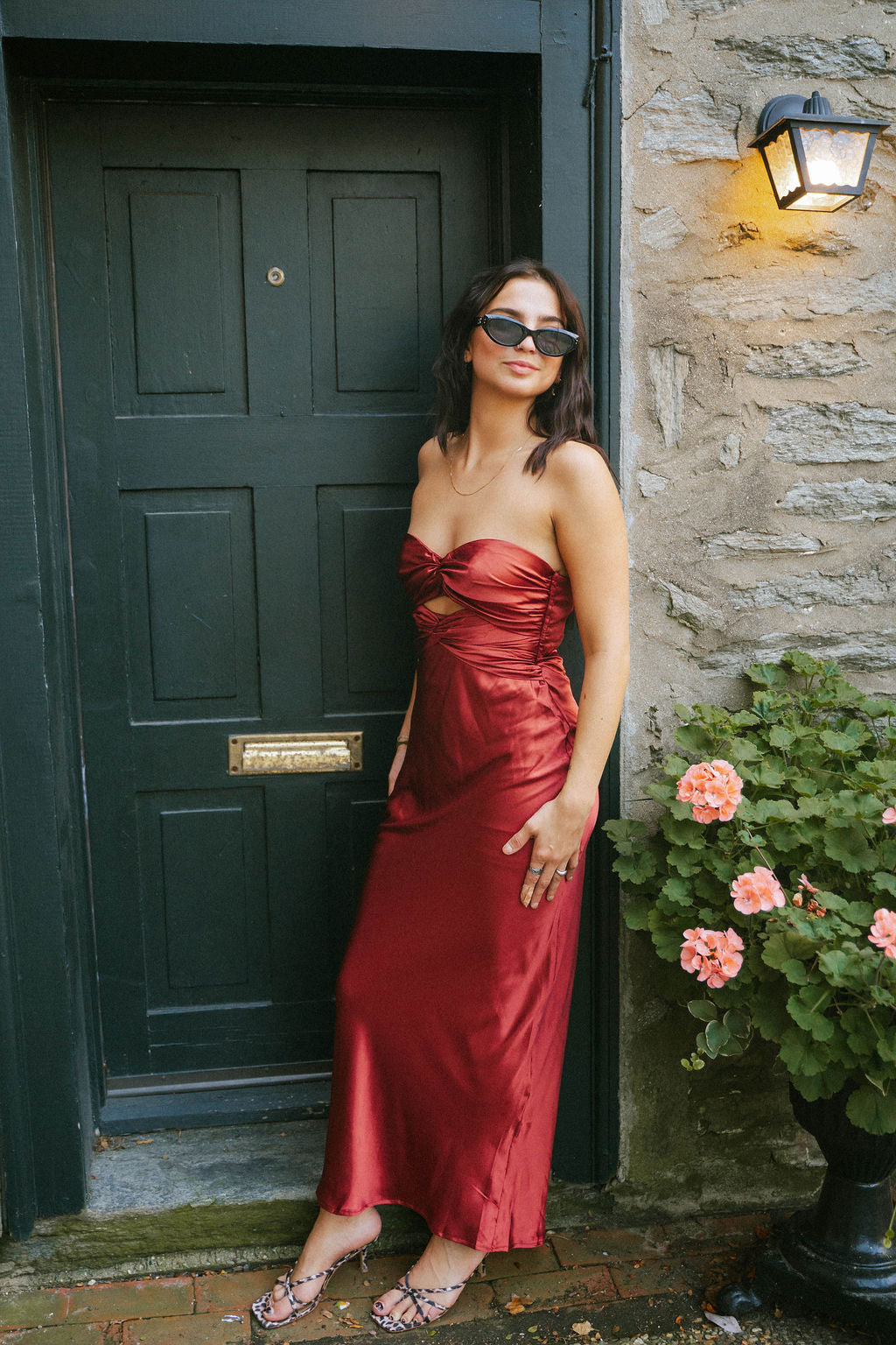 crimson satin strapless maxi with ruched detailing